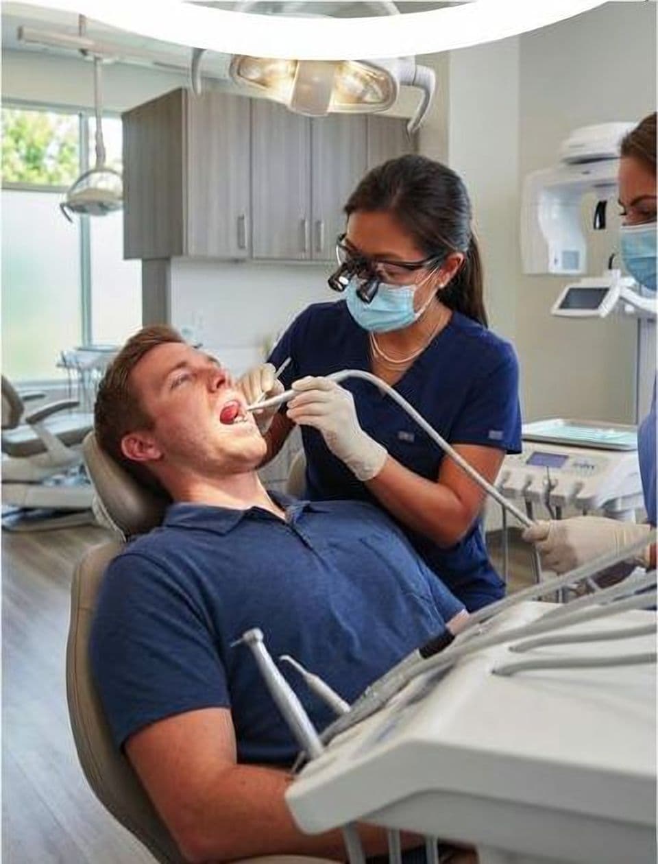 Dentist treating a patient